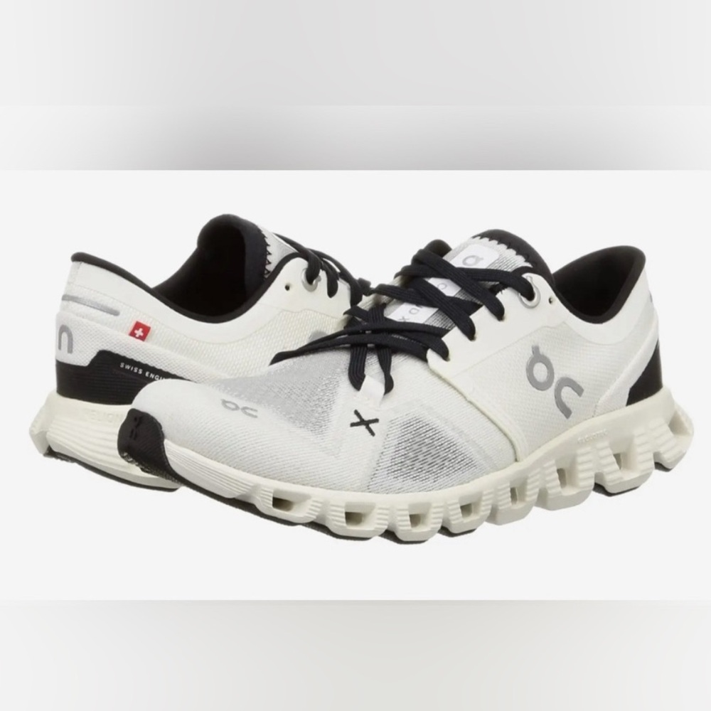 On Running White and Black Athletic Shoes